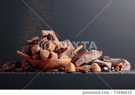 Various chocolates with ingredients. Various chocolates with ingredients. 73496818