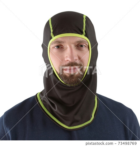 brunette man in a blue shirt with a black balaclava with neon green edging brunette man in a blue shirt with a black balaclava with neon green edging 73498769