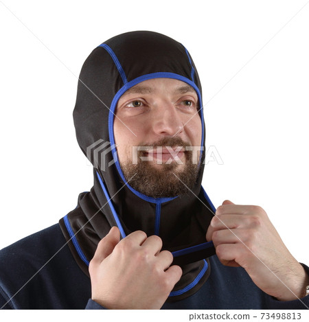 brunette man in a blue shirt with a black balaclava with dark blue edging brunette man in a blue shirt with a black balaclava with dark blue edging 73498813