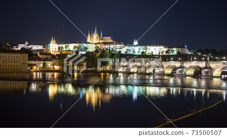 Pargue charles bridge and prague castle by night reflections river Pargue charles bridge and prague castle by night reflections river 73500507