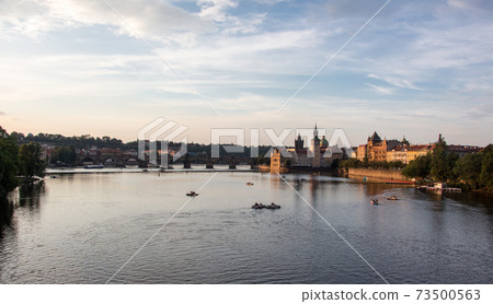 Charles bridge prague sunset light beautiful river water panoramic view Charles bridge prague sunset light beautiful river water panoramic view 73500563