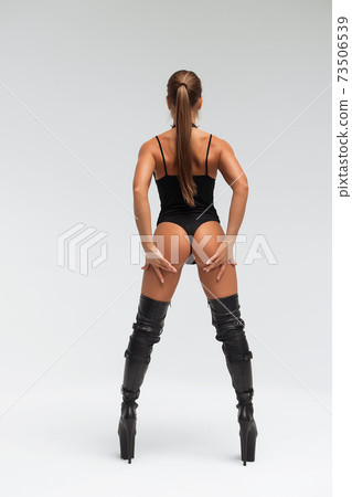 Slim woman in sexy lingerie and boots 73506539