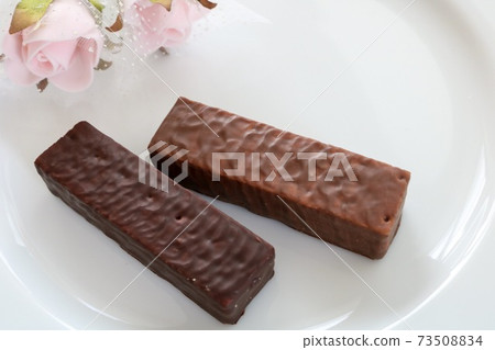 Rose flowers and sweets Valentine chocolate white plate rest cafe luxury brand Rose flowers and sweets Valentine chocolate white plate rest cafe luxury brand 73508834