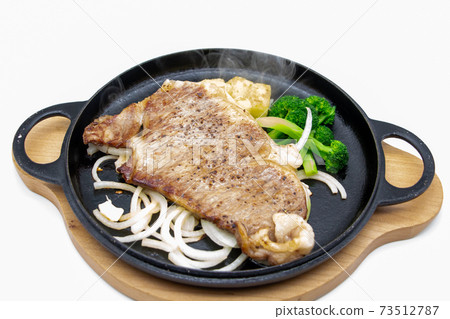 Saga beef steak on an iron plate of Nanbu Tekki 73512787