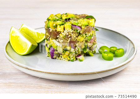 Seafood tuna fish ceviche salad avocado, lime, hot chili pepper, red onion, cilantro, sesame seeds Seafood tuna fish ceviche salad avocado, lime, hot chili pepper, red onion, cilantro, sesame seeds 73514490