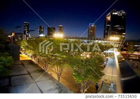 Night view of buildings in Umeda, Osaka 73515650