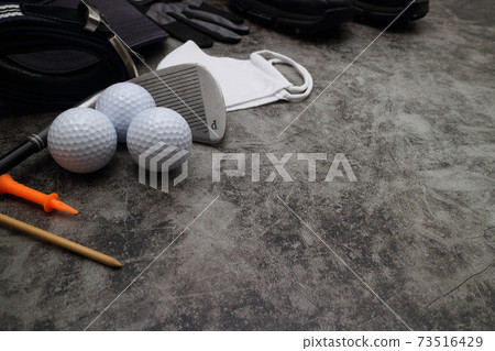 golf ball and accessories on floor golf ball and accessories on floor 73516429