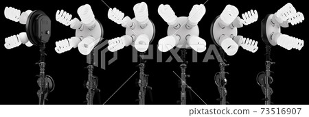 4 lightbulbs in lamp holder on studio stand isolated on black background 4 lightbulbs in lamp holder on studio stand isolated on black background 73516907