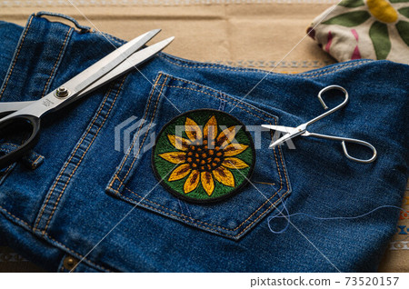 Jeans and appliqué Jeans and appliqué 73520157