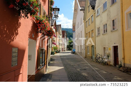 historic fairy tale street in the village of fussen in germany during lockdown because of coronavirus historic fairy tale street in the village of fussen in germany during lockdown because of coronavirus 73523225