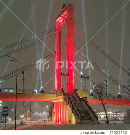 Kaunas is illuminated with the colors of the Lithuanian flag red, green, yellow commemorating January 13, 2021, Lithuania, Europe. Travel destinations 73523518