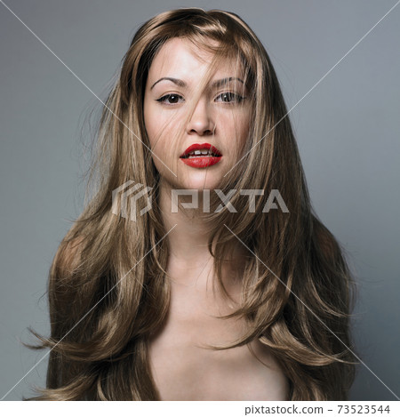 Sexy young woman with blonde hairs Sexy young woman with blonde hairs 73523544