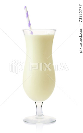 Glass of vanilla milkshake isolated on white Glass of vanilla milkshake isolated on white 73525777