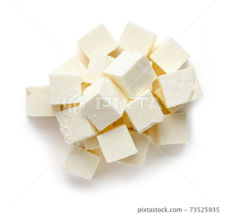 Heap of soft cheese squares from above Heap of soft cheese squares from above 73525935