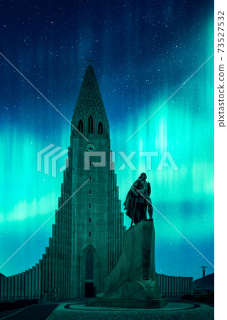 Aurora borealis Northern lights shining over the church in Reykjavik 73527532