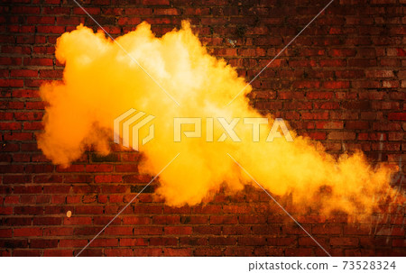 White, dense fume on the brick wall background 73528324