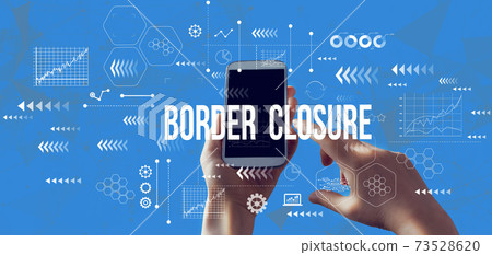 Border Closure Theme with smartphone 73528620