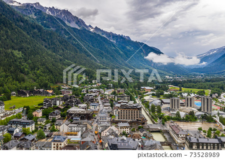 Beautiful aerial view of downtown Chamonix valley and Alps mountains Beautiful aerial view of downtown Chamonix valley and Alps mountains 73528989