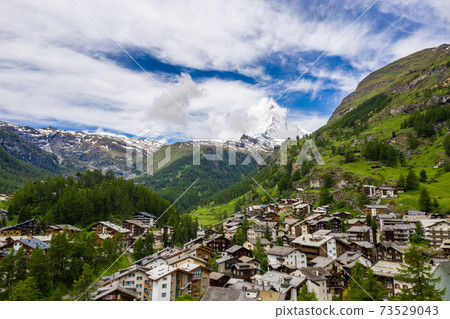 Spectacular scenery of beautiful Zermatt valley and Matterhorn peak 73529043
