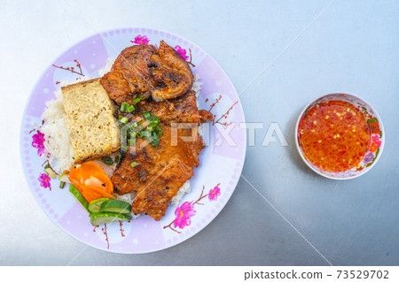 Overhead view photo of Vietnamese pork chop rice Overhead view photo of Vietnamese pork chop rice 73529702