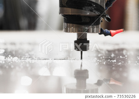 End mill processes a plastic sheet 73530226