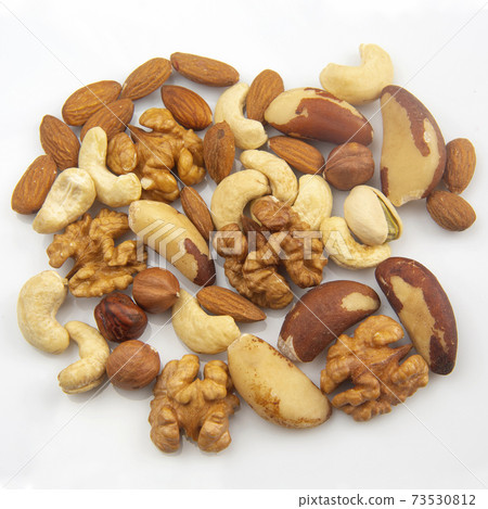 different nuts on a white background. protein and healthy food 73530812