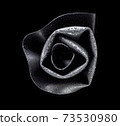 Black rose covered with dew 73530980