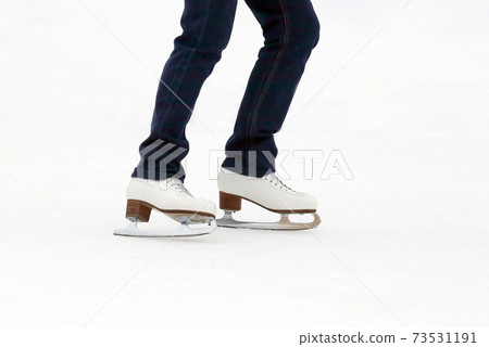 people skating on the ice rink people skating on the ice rink 73531191