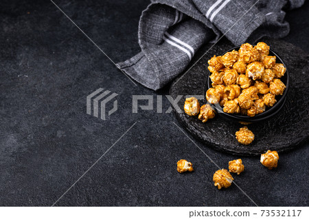 Salted caramel popcorn in bowl Salted caramel popcorn in bowl 73532117
