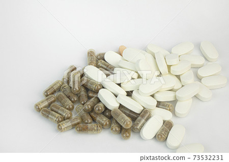 Pills on a white background Pills on a white background 73532231