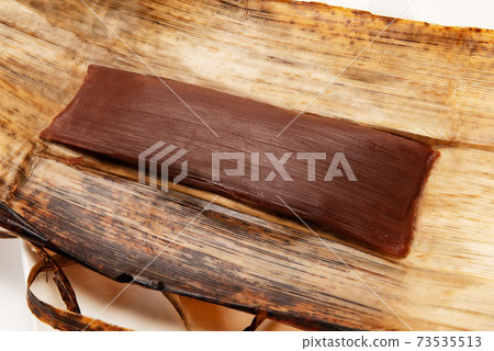 Apprentice yokan wrapped in bamboo skin 73535513