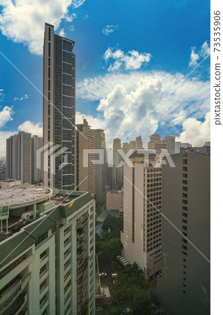 Financial district in modern city in the cloudy day 73535906