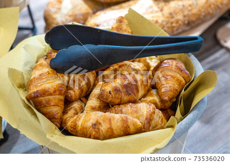 Delicious and fresh croissant pastry in luxury French restaurant Delicious and fresh croissant pastry in luxury French restaurant 73536020