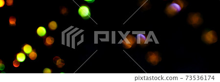 Gold bokeh stars on black background. Yellow glitter backdrop. Golden texture Gold bokeh stars on black background. Yellow glitter backdrop. Golden texture 73536174