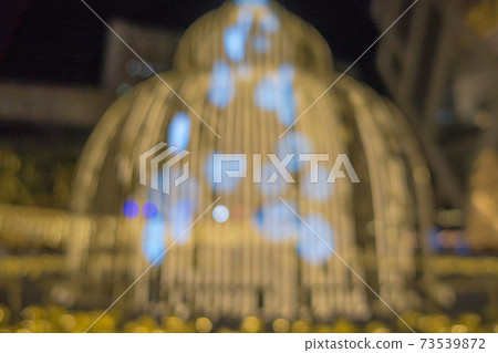 Blur the Christmas lights at night in the city. Blur the Christmas lights at night in the city. 73539872