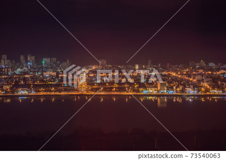 The architecture shimmering under the night-lit city makes the city more vibrant in Da Nang, Vietnam The architecture shimmering under the night-lit city makes the city more vibrant in Da Nang, Vietnam 73540063