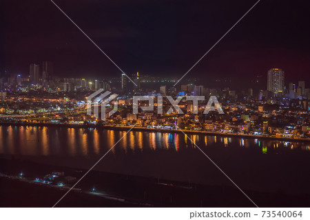 The architecture shimmering under the night-lit city makes the city more vibrant in Da Nang, Vietnam 73540064