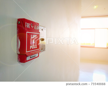Fire alarm on the wall of the industrial plant Fire alarm on the wall of the industrial plant 73540088