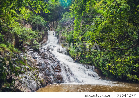 Beautiful cascading Datanla waterfall In the mountain town Dalat, Vietnam Beautiful cascading Datanla waterfall In the mountain town Dalat, Vietnam 73544277