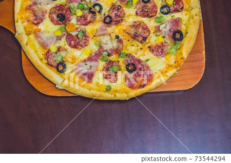 Homemade cheese pizza with salami, delicious pizza with cheddar 73544294