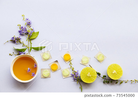 cough sore throat pastille pills from herbal honey and lemon with purple flowers cough sore throat pastille pills from herbal honey and lemon with purple flowers 73545000