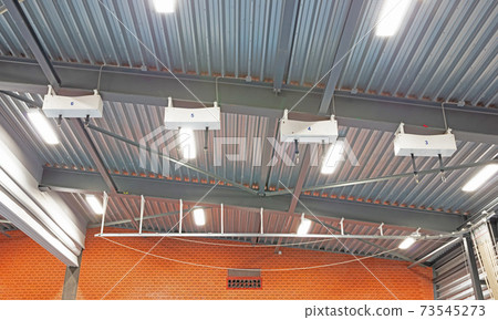 Interior of a large school gym hall 73545273