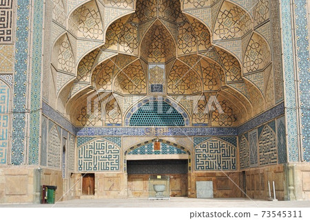 Isfahan Iran. The Jameh Mosque dated back 8th century. Translation from the Persian calligraphy on the wall: Prophet is City of knowledge and Ali Is The Door to Enter The City . 73545311