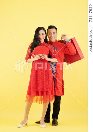 Couple ready for Tet clebration 73547639