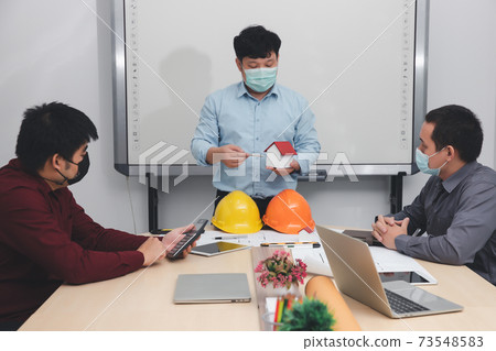 Engineer and Architect concept, Engineer Architects and Interior designer working with blueprints Engineer and Architect concept, Engineer Architects and Interior designer working with blueprints 73548583