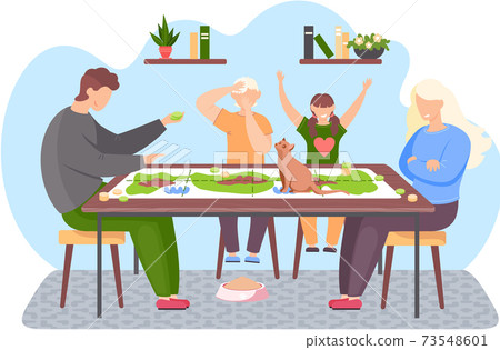People at home. Happy family is playing board game together. The cat is sitting on the table People at home. Happy family is playing board game together. The cat is sitting on the table 73548601