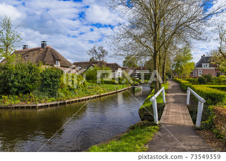 Typical dutch village Giethoorn in Netherlands 73549359