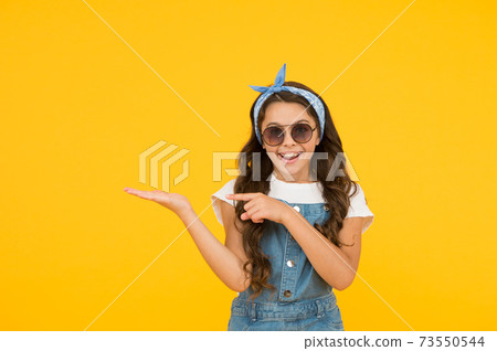Fancy girl pointing copy space, seasonal sale concept 73550544