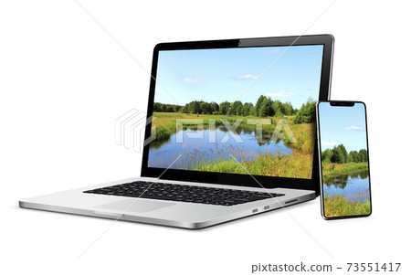Laptop and phone with landscape wallpaper on screen Laptop and phone with landscape wallpaper on screen 73551417