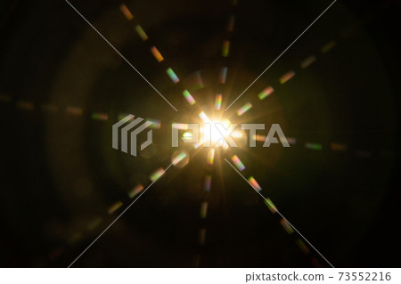 Abstract sun flare. The lens flare is subject to digital correction 73552216